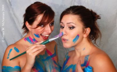 Kimberly Marvel and London Andrews goofing around with paint and looking ad...